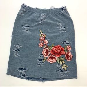 Distressed blue mini-skirt, medium